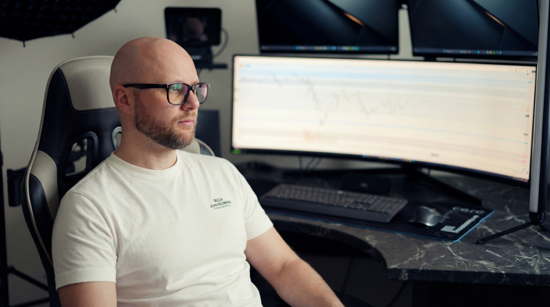 Rolandas at his trading desk